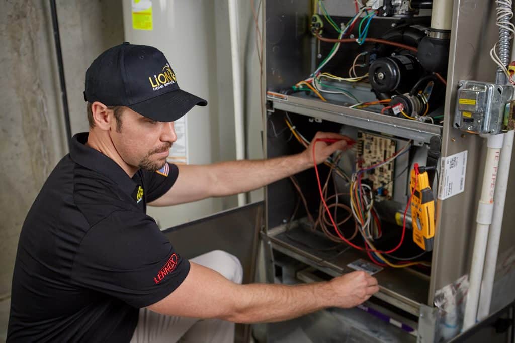 technician performing annual furnace inspections
